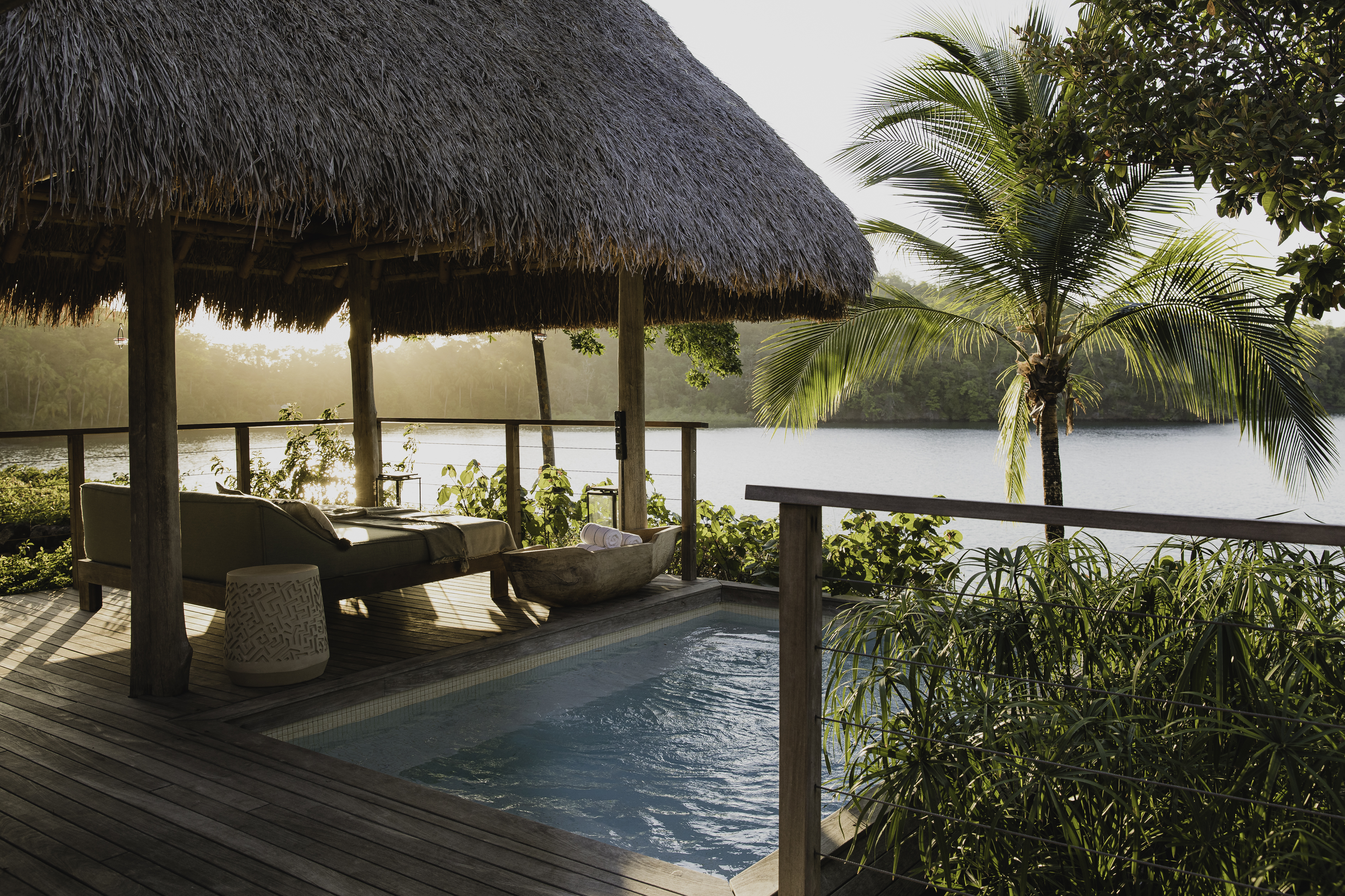 Thatched-roof casita with a private plunge pool overlooking a lagoon at Islas Secas, Panama