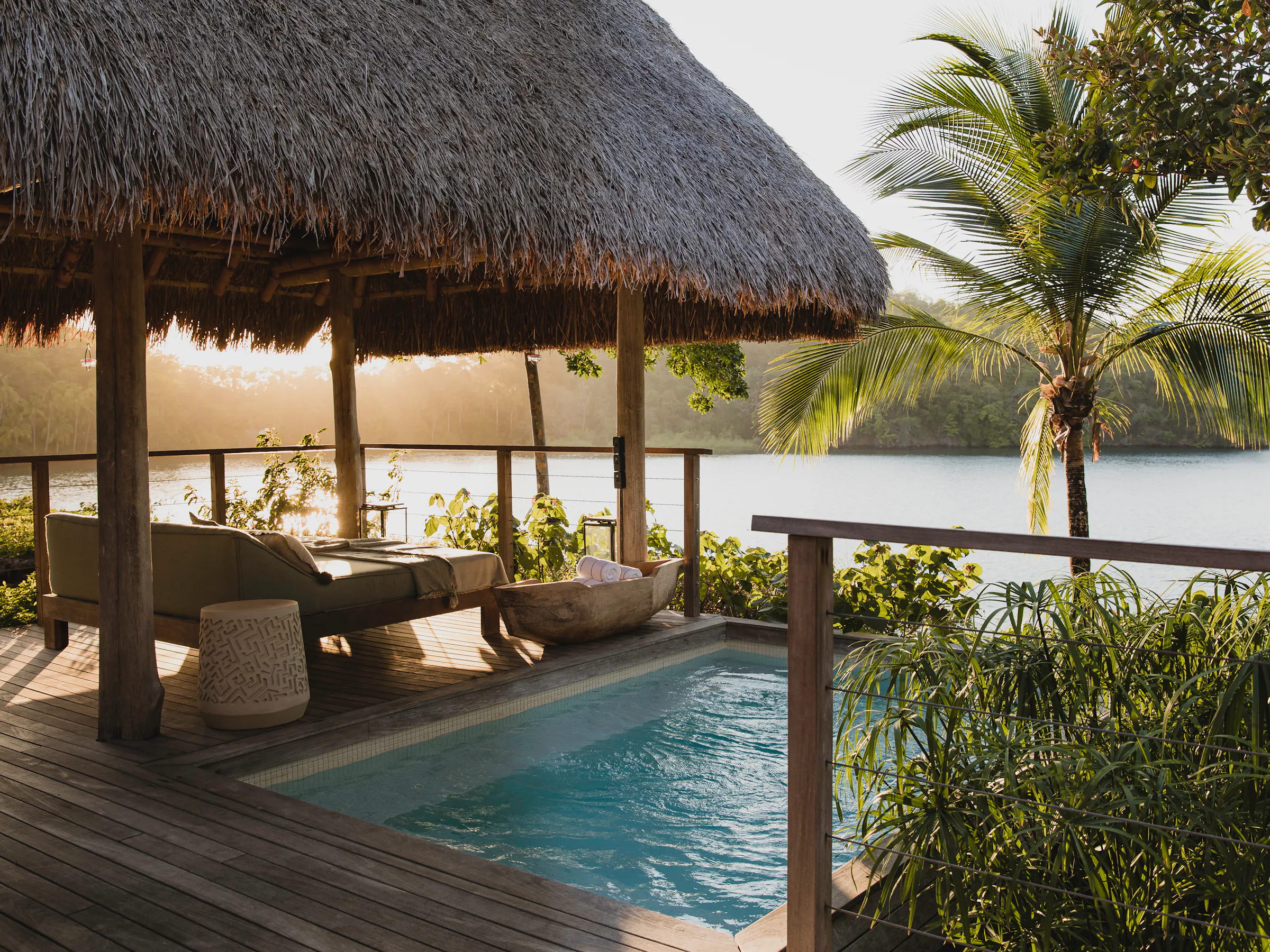 Thatched-roof casita with a private plunge pool overlooking a lagoon at Islas Secas, Panama