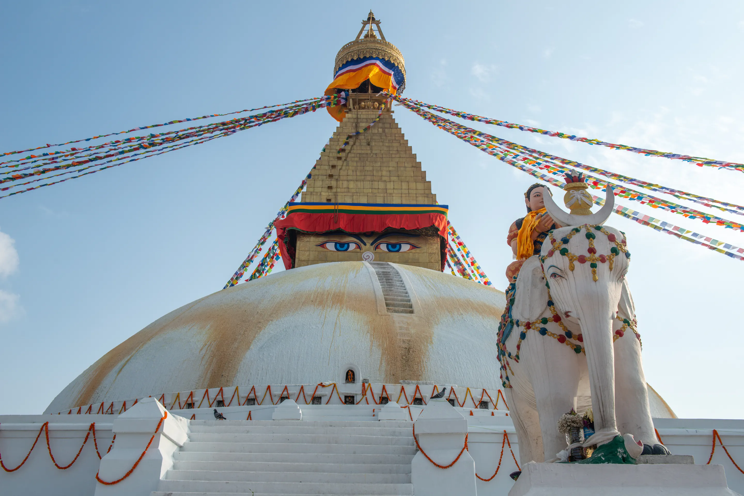 Boudhanath Stupa with Buddha eyes and prayer flags in Kathmandu, Nepal