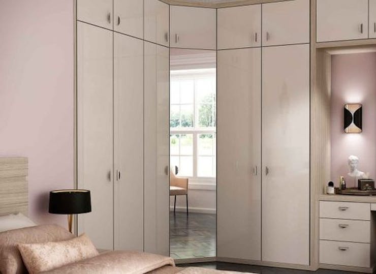 A Corner Wardrobe And Dressing Table