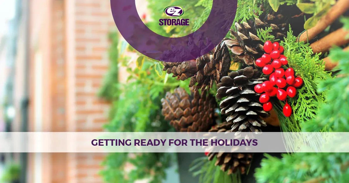 Further close-up of holiday wreath with EZ Storage logo and text "Getting Ready for the Holidays"