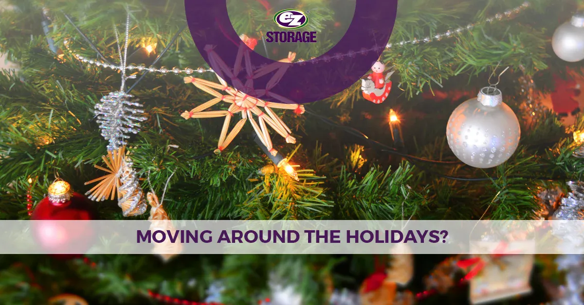 Ornaments on a christmas tree with text "moving around the holidays?"