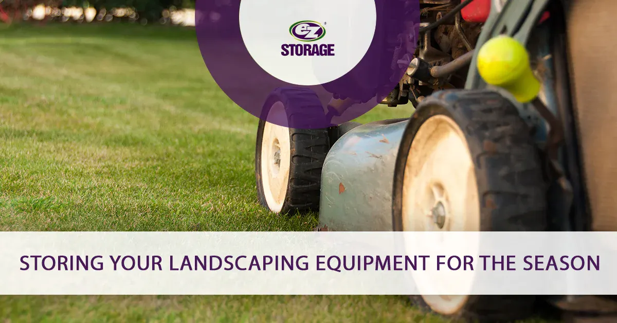 Close up of lawn mower cutting grass and text "Storing your landscaping equipment for the season"