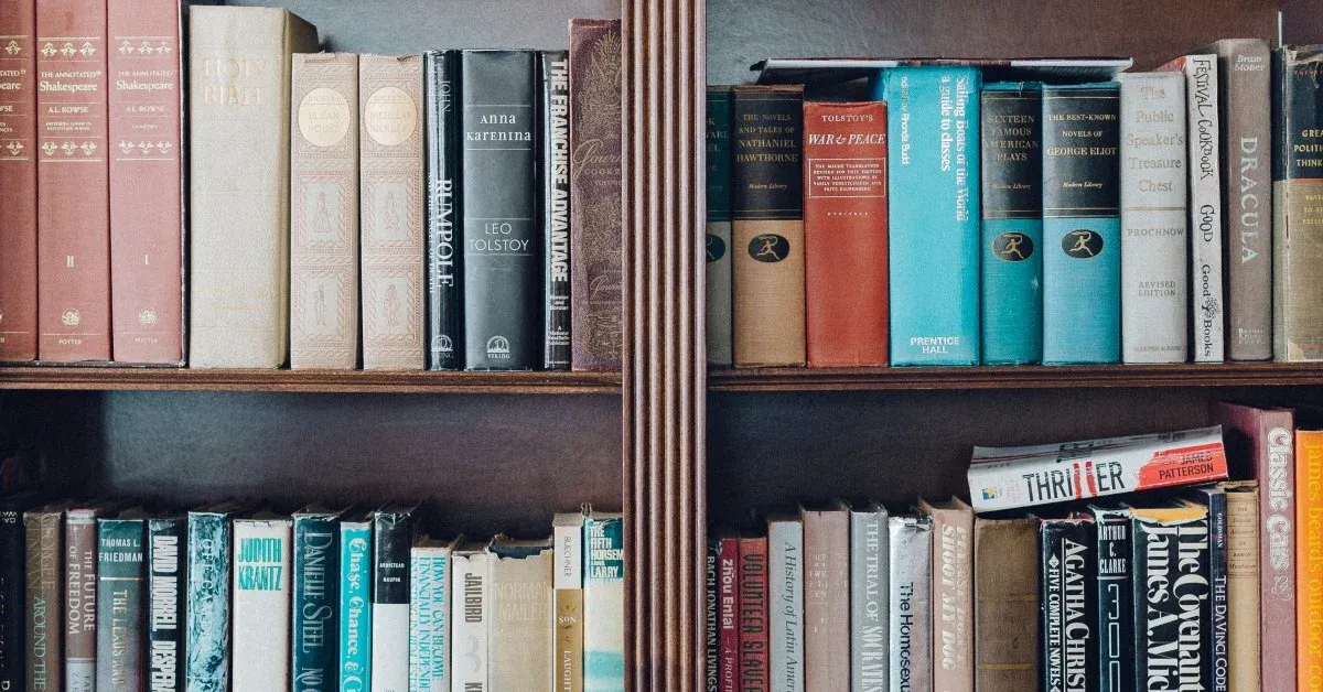 Close-up of book shelf with hardcover books