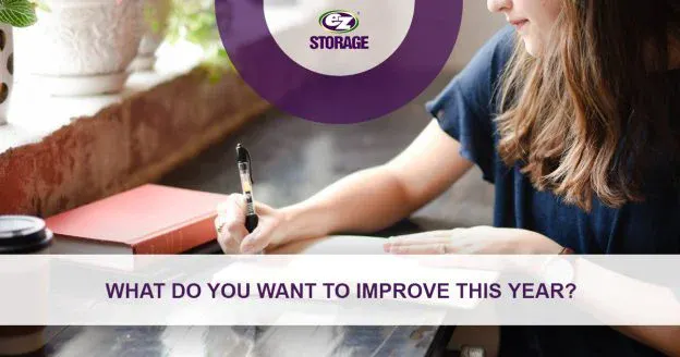 Women writing in a notebook at a desk and text "What do you want to improve this year?"