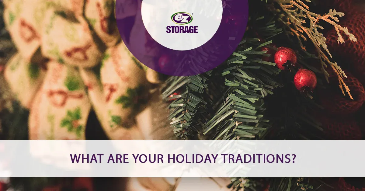 Closeup of holiday wreath and mistletoe with banner text "What are your holiday traditions?"
