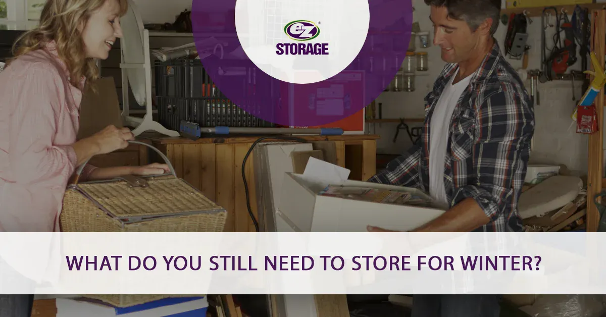 Couple organizing their garage and text "What do you still need to store for winter?"