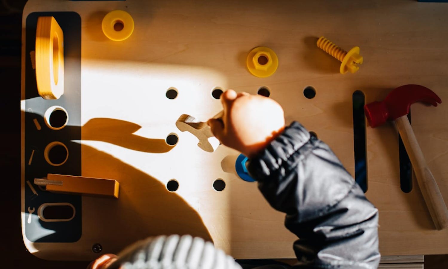 A child creating and making.