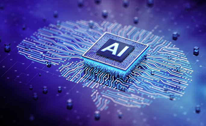 AI written on a button and connected to wires