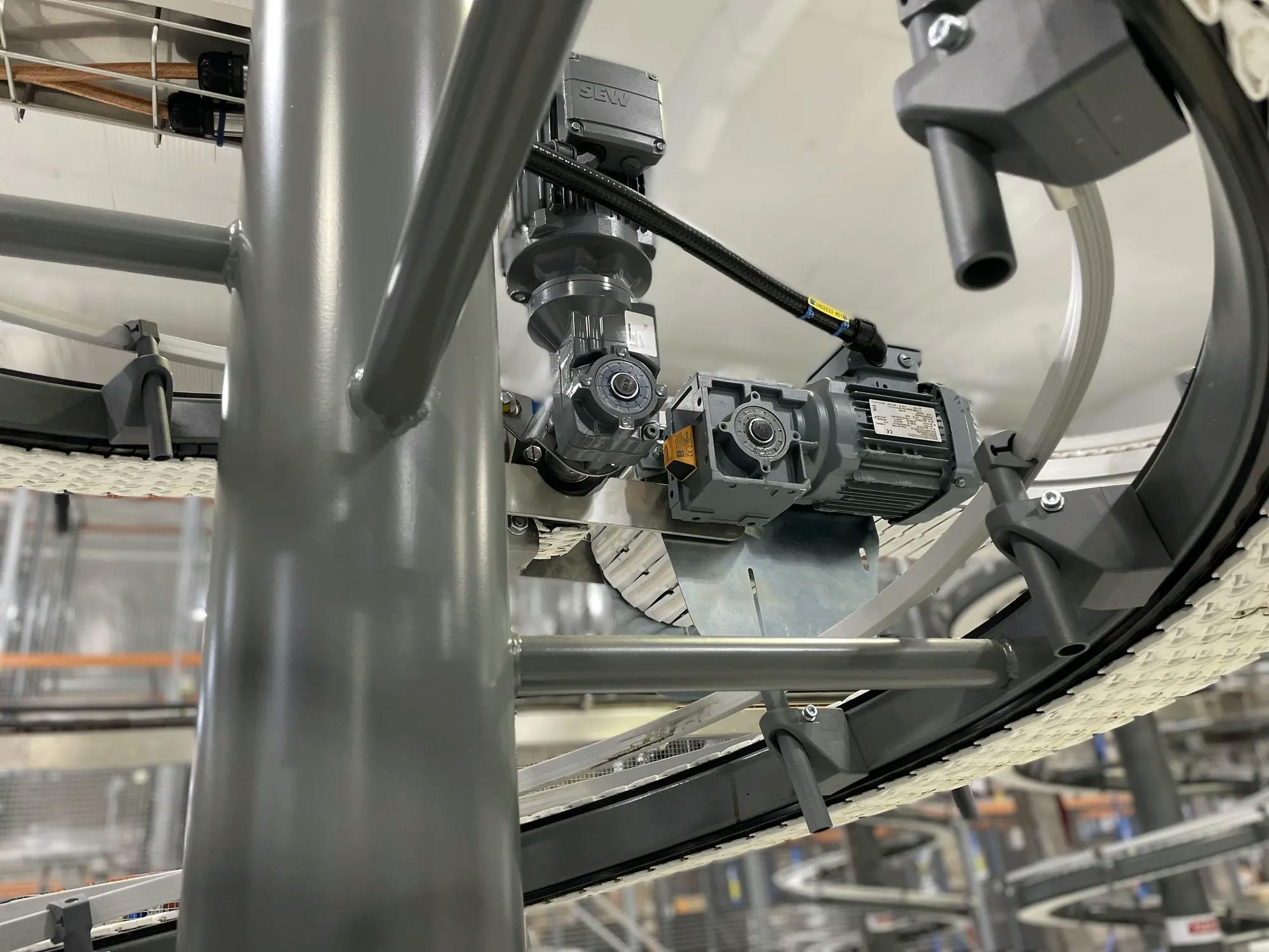 Conveyor in a food manufacturing environment