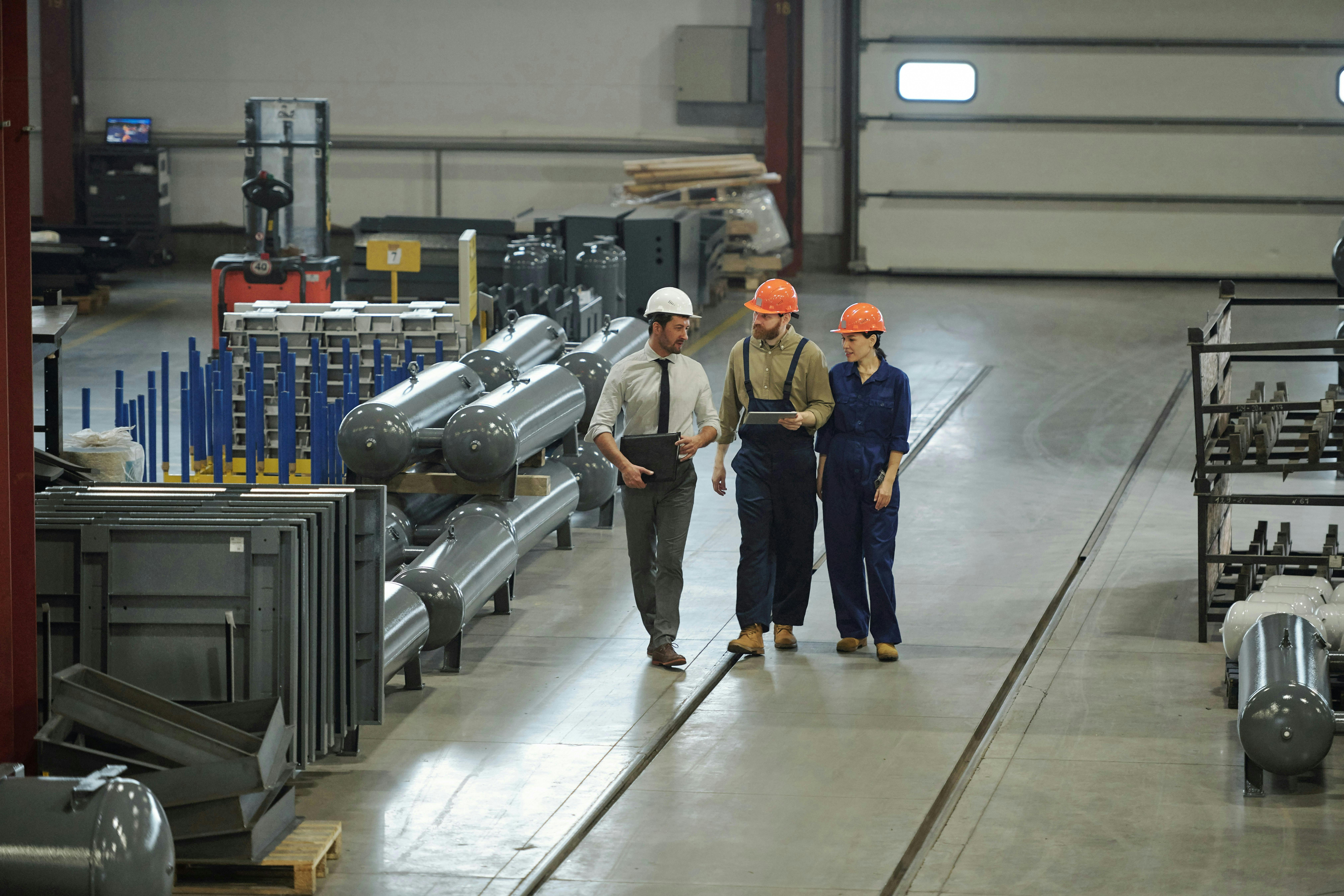 A production team conducting the daily huddle