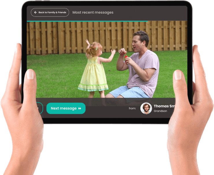 Hands holding iPad running the Familia app