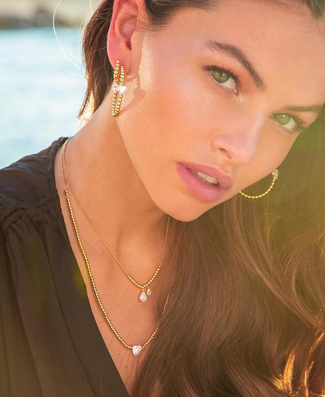 APM earrings and necklace