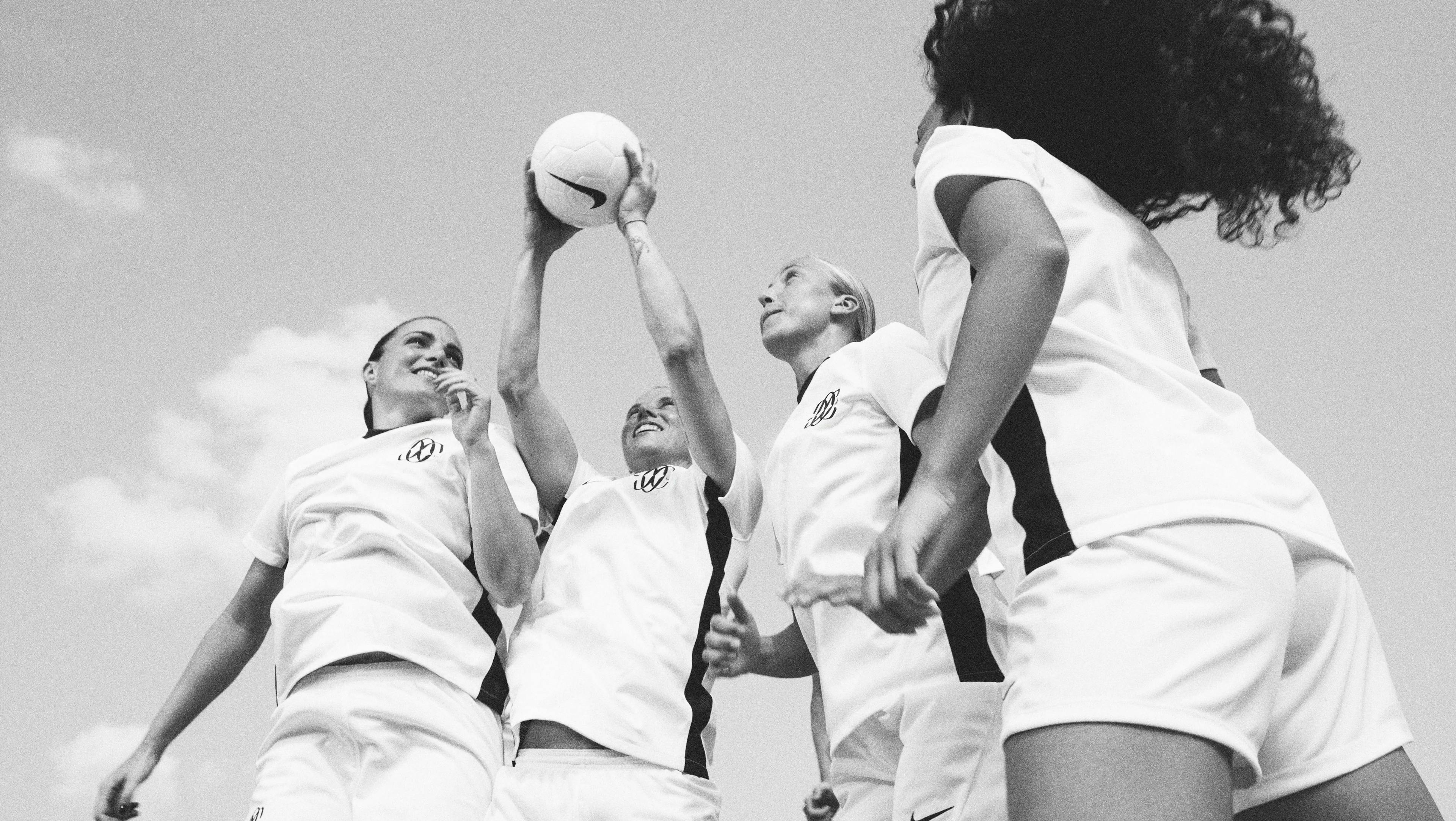 Four Como players in white kits