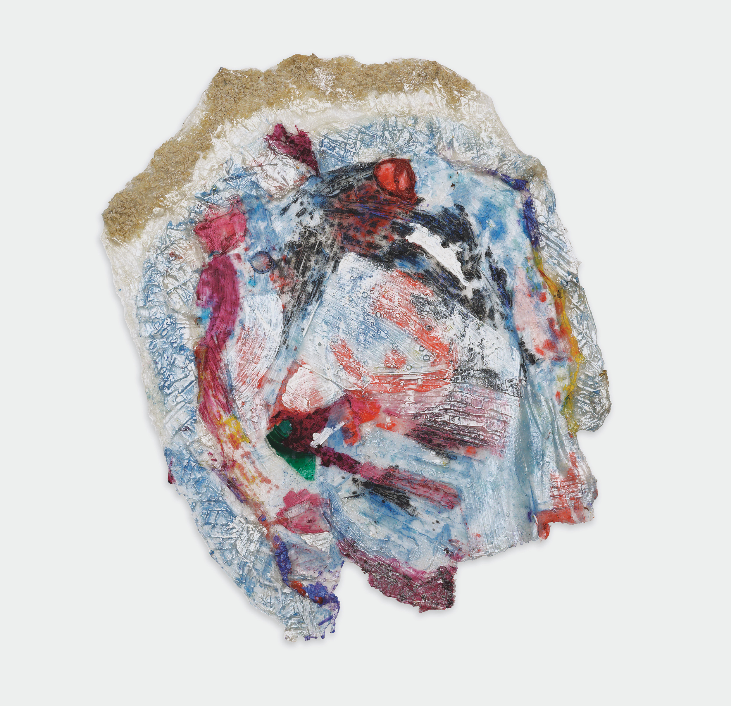 A mostly flat mounted sculpture made from layers of acrylic paint, primarily silver and light blue with swathes of red, some black, and flecks of yellow, purple, and magenta. Different textures appear in the surface, including thick brushstrokes and cavities left by popped air bubbles.  