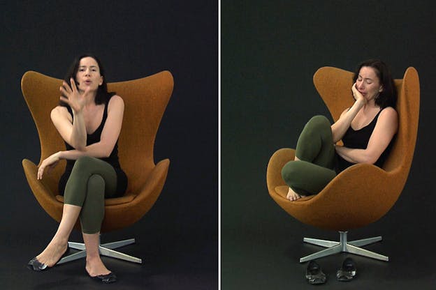 Image of split in two showcasing the same woman dressed in green pants and a black shirt in a brown armchair. In the image to the left they face their camera with crossed legs and an arm facing the viewer. On the right they sit sideways crouching on the armchair with one hand under the chin.  