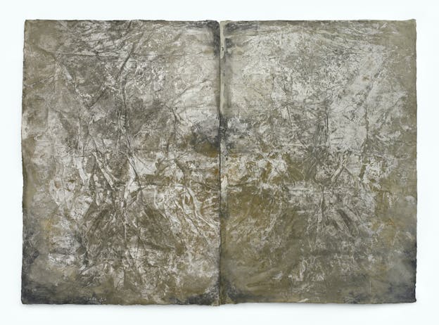 Two panels of paper that have been slightly crumpled, folded, and wrinkled, painted with mottled black, white, gold, and gray.