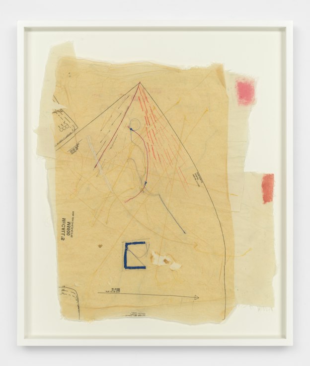 Within a frame, two pieces of off white fabric are layered below a piece of translucent, tan, sewing pattern paper. On the pattern paper are fine black pattern outlines and instructions in small black print, and embroidered dashes and rays in gray, magenta, yellow, and orange thread. 