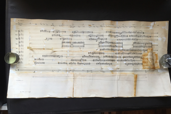 A music sheet with aging stains.
