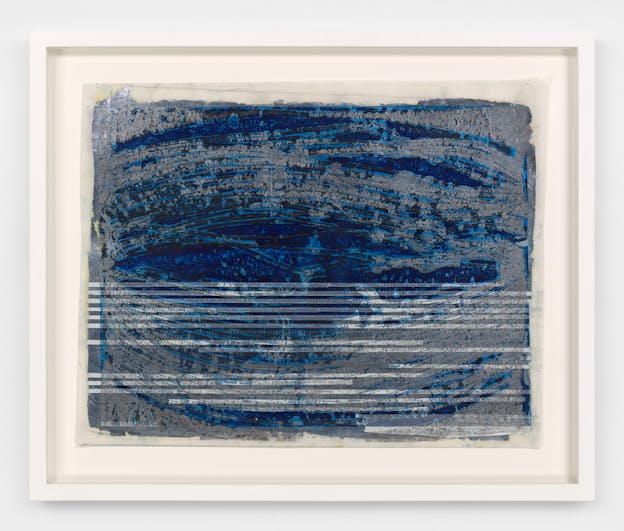 A two dimensional framed work on mylar with horizontal strokes of dark blue and some turquoise tones on a metallic gray background. The bottom half of the piece has straight horizontal white stripes and dotted lines layered and visible beneath the strokes of blue pigment. 
