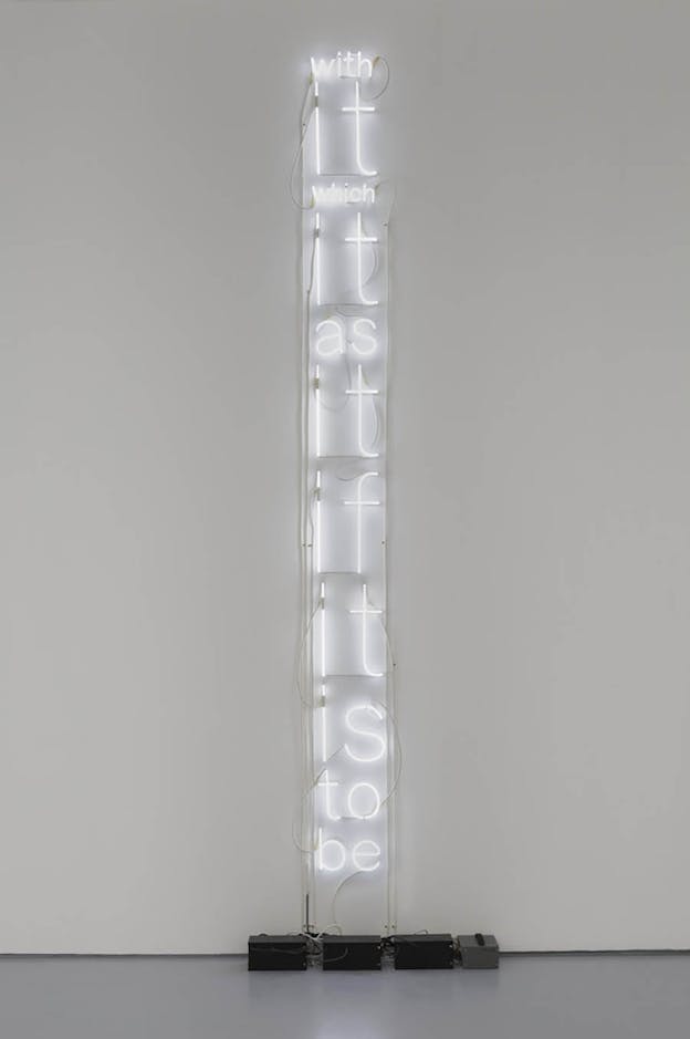 A sculpture of white neon tubes shaped into the words: 