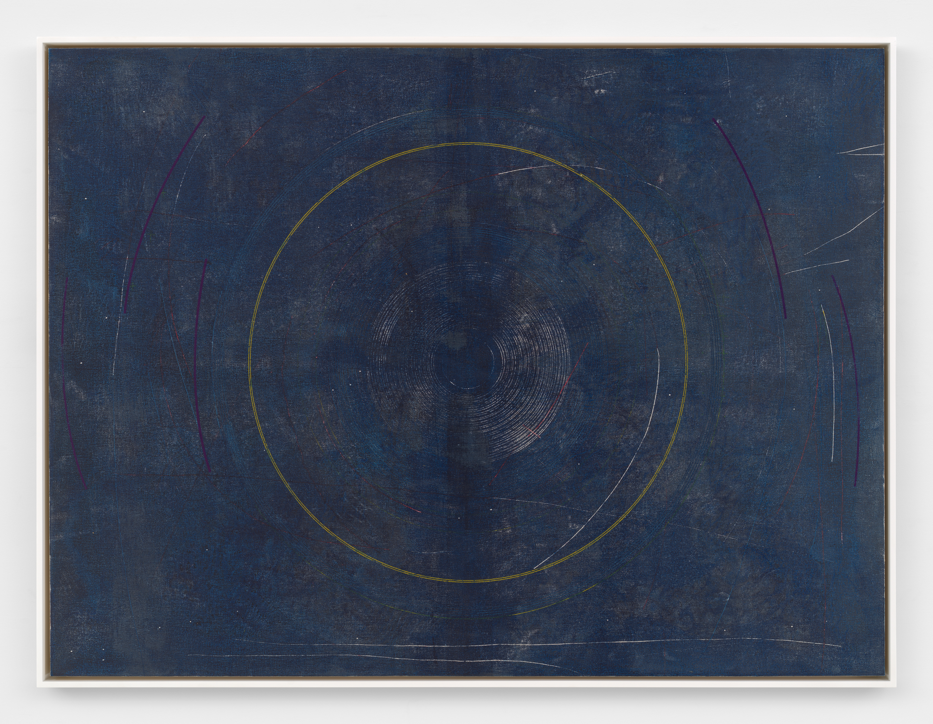 A framed screenprint depicting finely lined concentric rings of different colors centered against a deep indigo background. Magenta and orange curved lines appear outside of the central rings, along with light scratches of orange, white, and blue which distress the surface of the print.