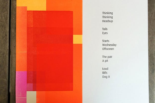 A page divided in two with the left side bearing a collage of red, orange, and pink rectangles and the right side a poem that reads: 