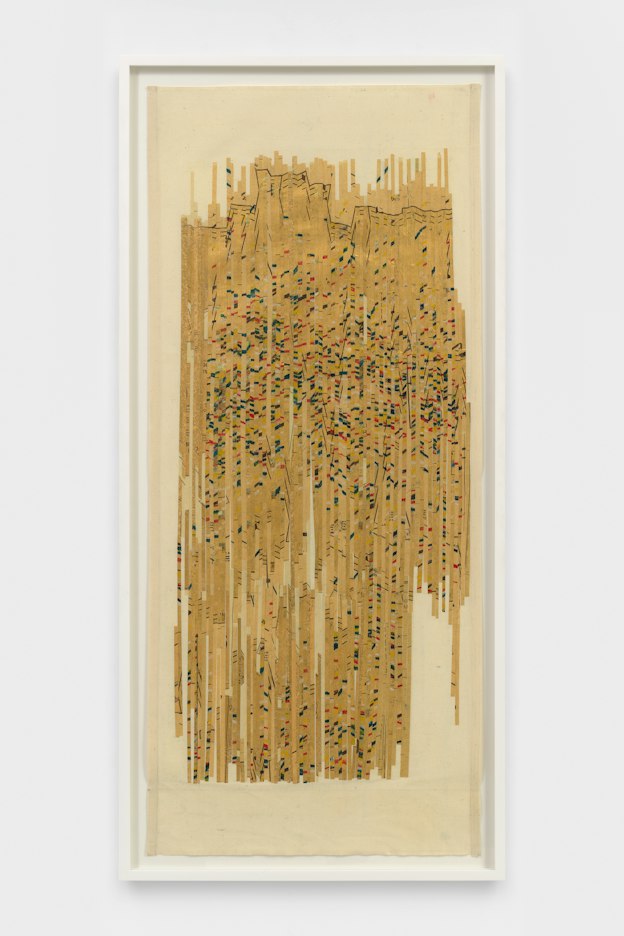 A collage made from thin strips of tan sewing pattern paper lined up next to each other vertically, decorated with flecks of yellow, white, black, red, and white wax.