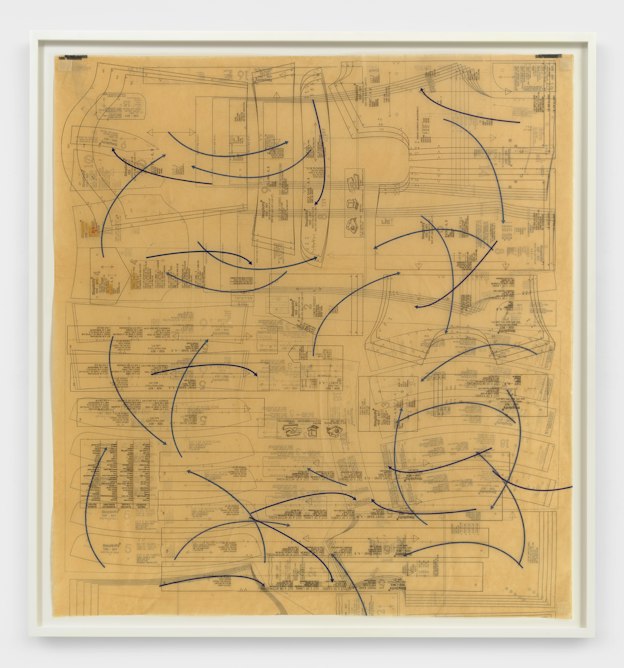 A square framed print of thin, curved navy blue arrows dispersed over tan, yellow layers of pattern paper with small black text.