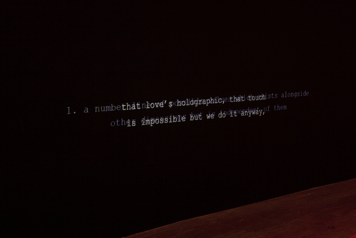 Overlapping white text on a black background reads 