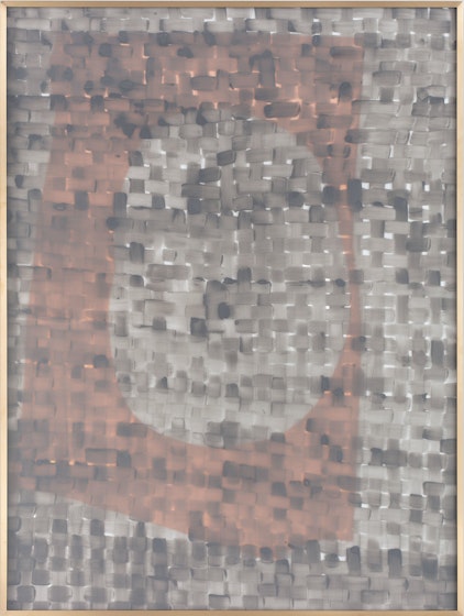 A semi transparent peach-colored asymmetrical rectangle shape with an oval cut-out superimposed atop gray brushstrokes resembling a checkerboard weave pattern.