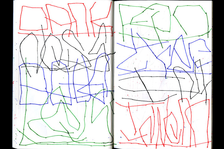 Red, black, green, and blue thin, scratch-like drawings mark illegible words across two horizontal white journal sheets. One hardly legible word appears to be 