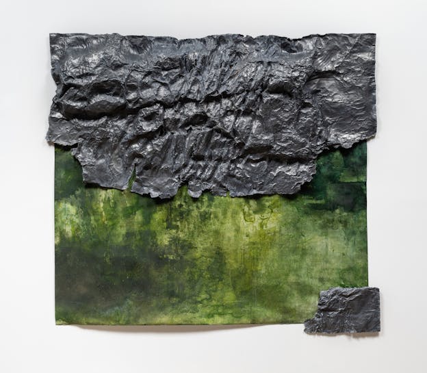 An almost square painting in shades of green ink. A dark grey sheet of geological material covers the upper half of the painting, its bottom edge torn and ragged. The lower right corner of the painting is covered by a piece of the same dark grey material. 