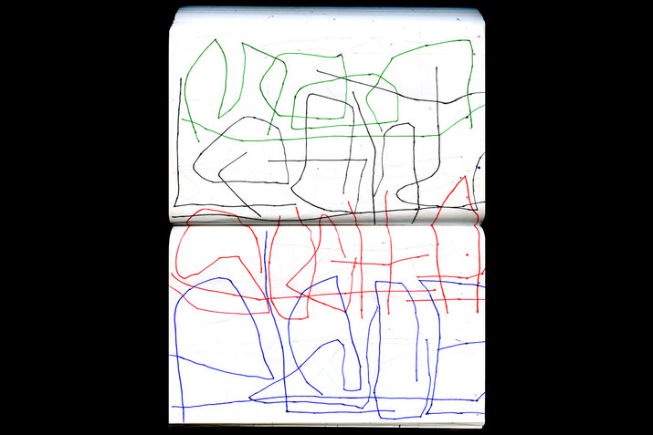 Red, black, green, and blue thin, scratch-like drawings mark illegible words across two vertical white journal sheets.