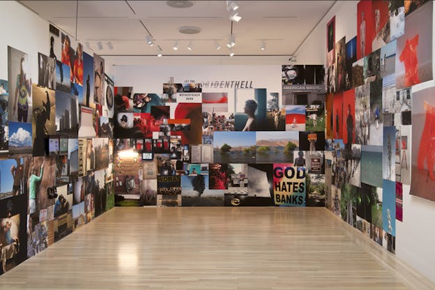 A collage of various pictures with the color red present on three walls.