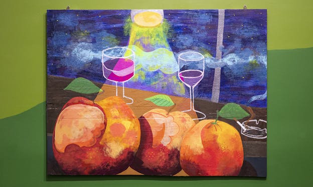 A painting of two wine glasses, three pieces of red/orange fruit, and an ash tray containing a still-smoking cigarette. The painting is mounted on a two-toned green wall.
