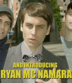 Three triangle shaped portraits of Ryan McNamara pieced together. On the left, he is pictured wearing a grey hood and navy parka and stands in front of a blurred red brick building. In the middle, he is pictured in front of a blurred street wearing a grey suit, lavendar shirt, and a black and white bowtie. On the right, he is pictured in front of red brick columns wears a grey t-shirt. On the bottom, yellow text reads: "And introducing Ryan Mc Namara" 