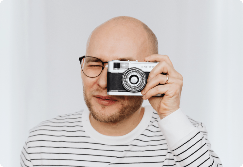 Man taking a photo with his camera