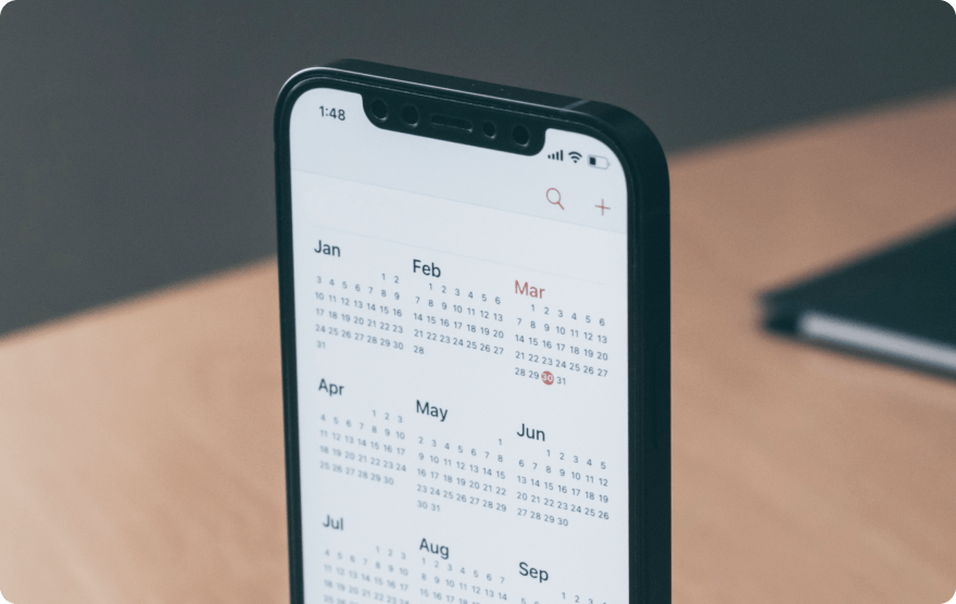 Mobile with the calendar app open.