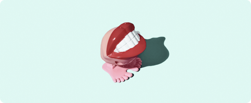 A toy with a nice smile and red lips.