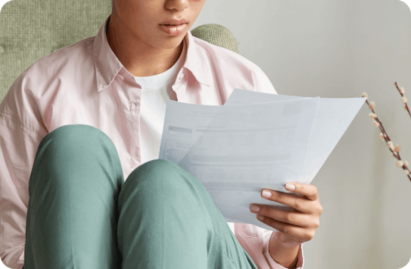 Woman reading traffic fine