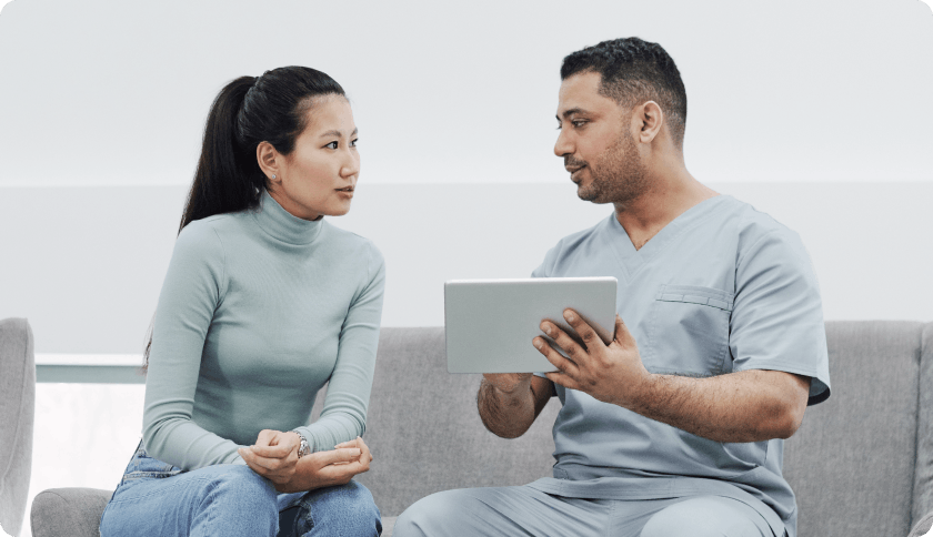 Doctor explaining medical results to woman
