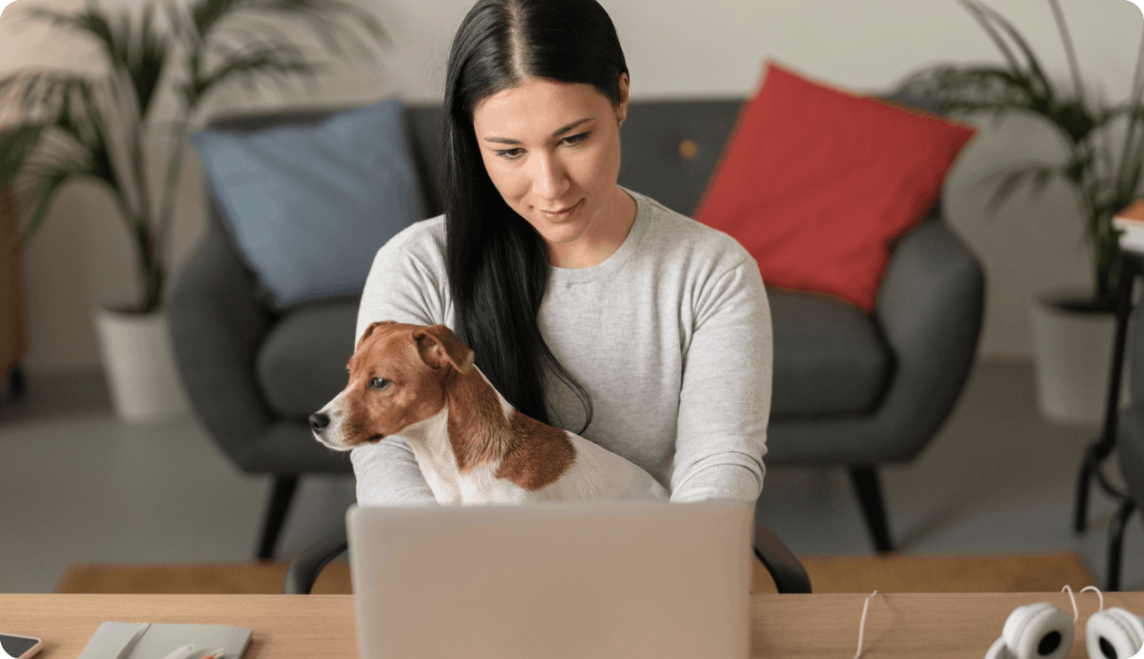 Woman and her dog choosing the right pet health insurance