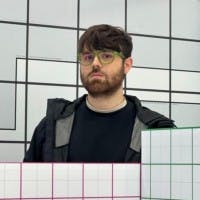 Photo of man in grid space