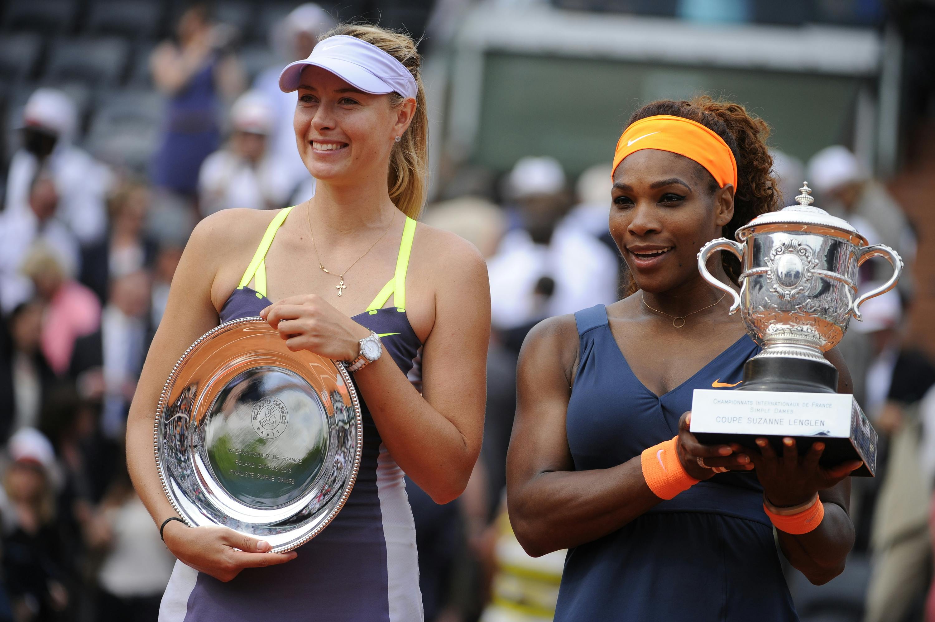 Serena Williams and Maria Sharapova after the final at Roland-Garros 2013