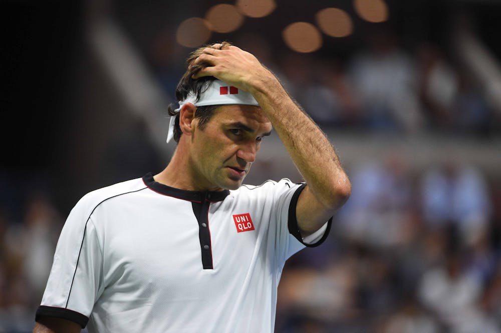 Roger Federer looking concerned durinh his second round match at the 2019 US Open