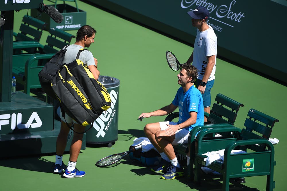Rafael Nadal and Stan Wawrinka chatting and laughing together in Indian Wells 2019.