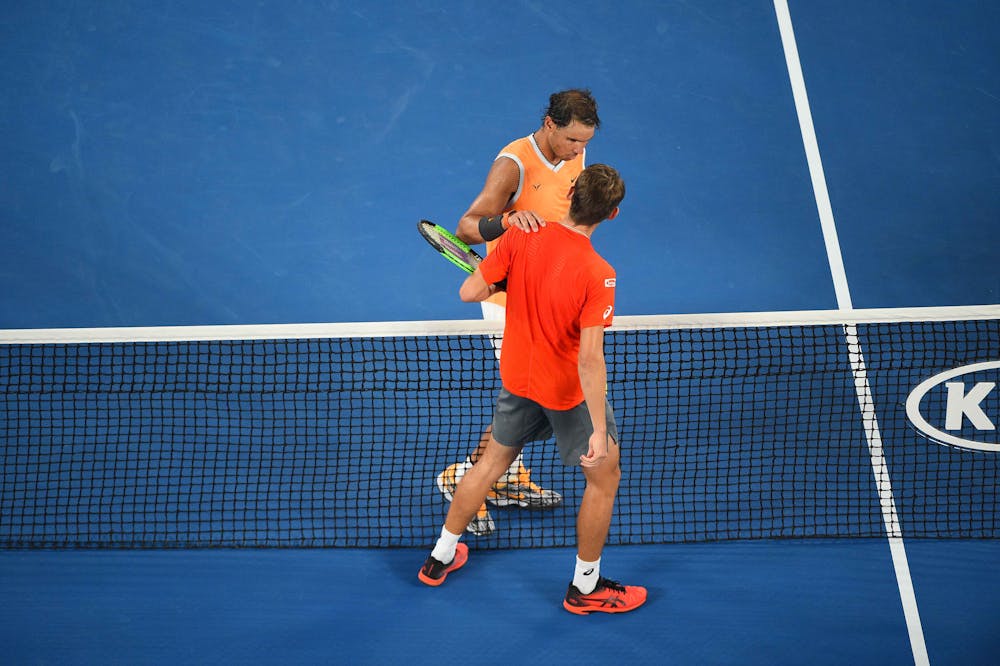 Rafael Nadal and Alex de Minaur at the net Australian Open 2019