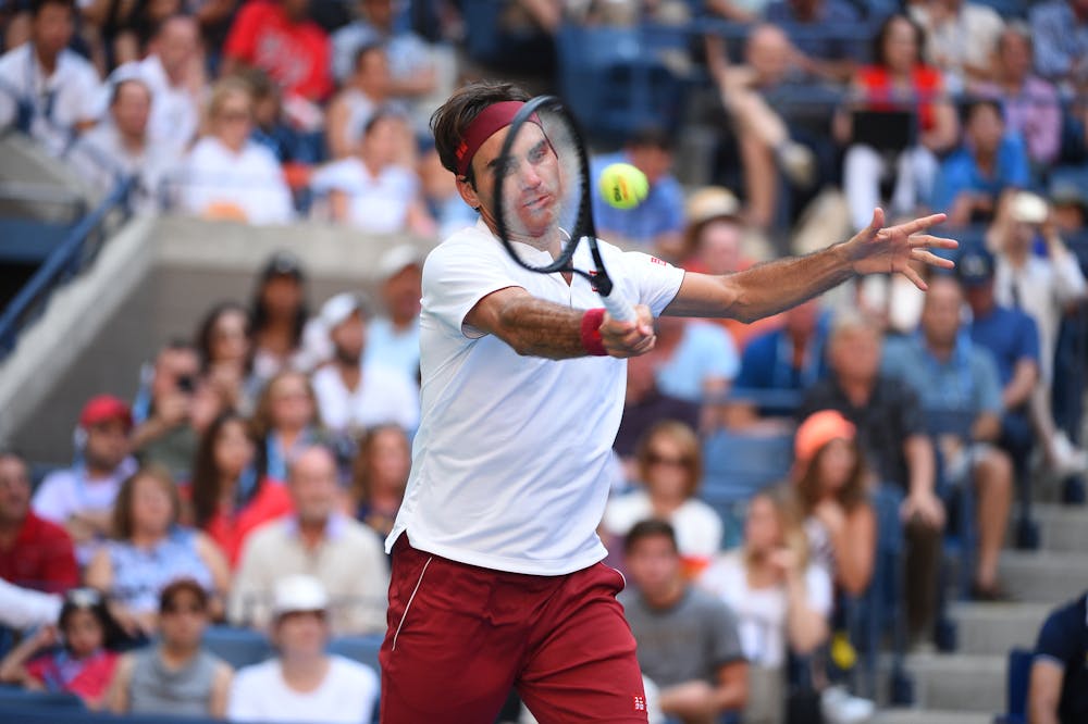 Roger Federer playing a forehand at the US Open 2018
