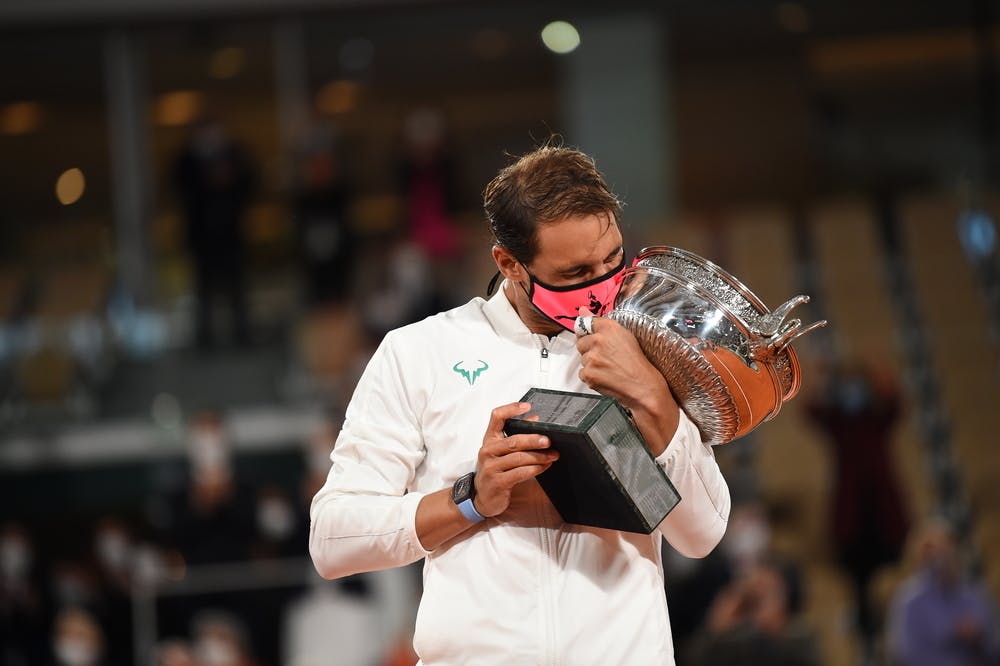 Rafael Nadal kissing his Roland-Garros 2020 trophy